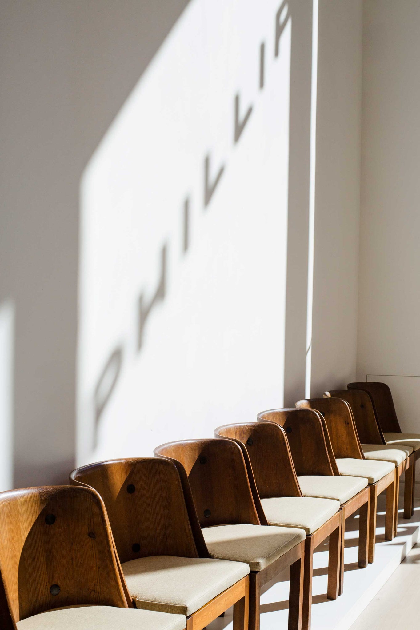 Shadow play, against the wall of Phillips Auction house in London.