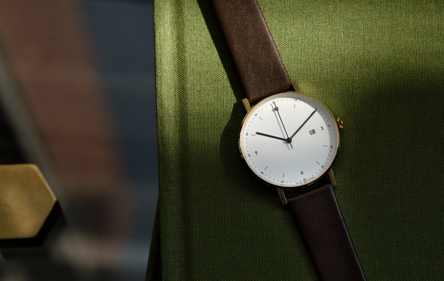 The PKG01-GO/DB/WH from VOID Watches, designed by Patrick Kim-Gustafson.